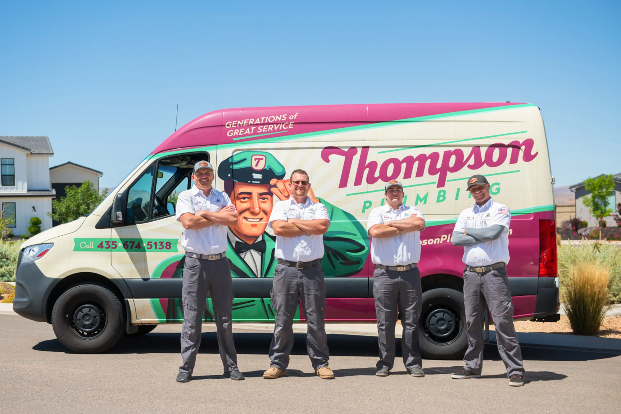 Thompson's St. George Utah HVAC, plumbing, and electric team posed with arms crossed in front of their branded Sprinter van